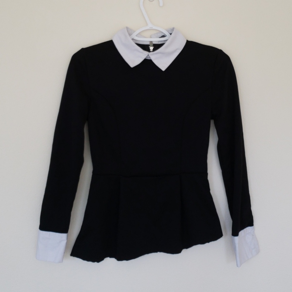 Asymmetrical peplum top